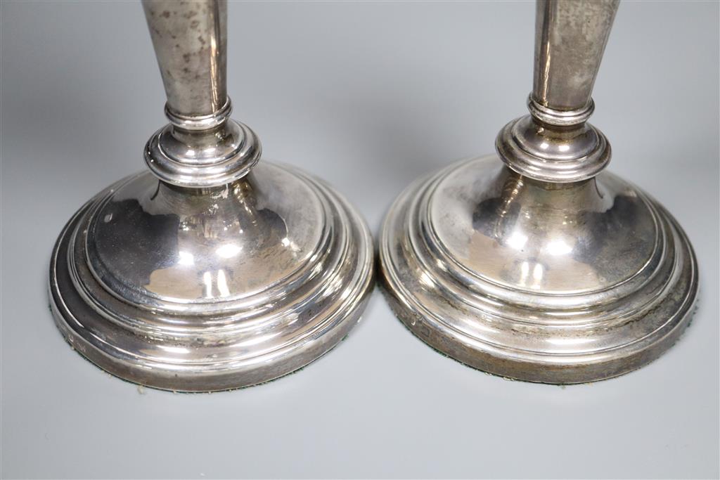 A pair of William IV silver pillar candlesticks, Sheffield 1832, Henry Wilkinson & Co, 23.4cm, weighted.